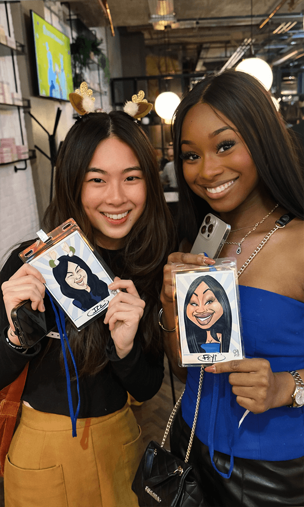 Two girls with caricature print
