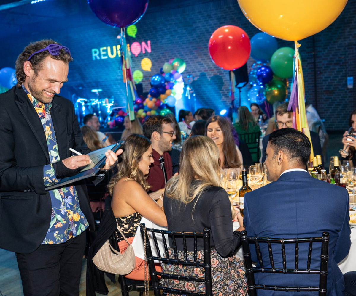 Award-night-celebration-entertainment-with-digital-caricatures-London Live digital caricature artist entertaining guests at awards night hospitality event