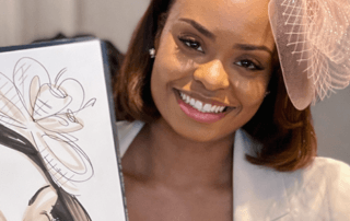 Wedding guest holding their caricature