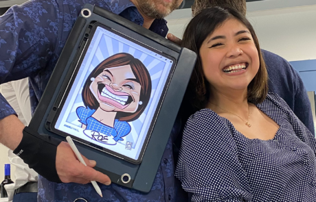 Fun caricature drawn live at London event with artist and guest interaction