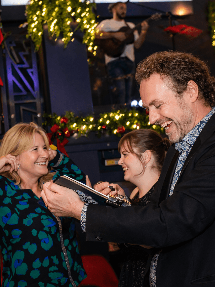 caricature artist drawing classic caricatures at a xmas party