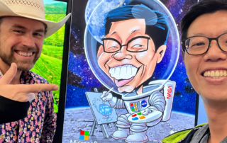 Artists-pose-beside-astronaut-caricature-S Sensible Pencil astronaut caricature with guest and artist