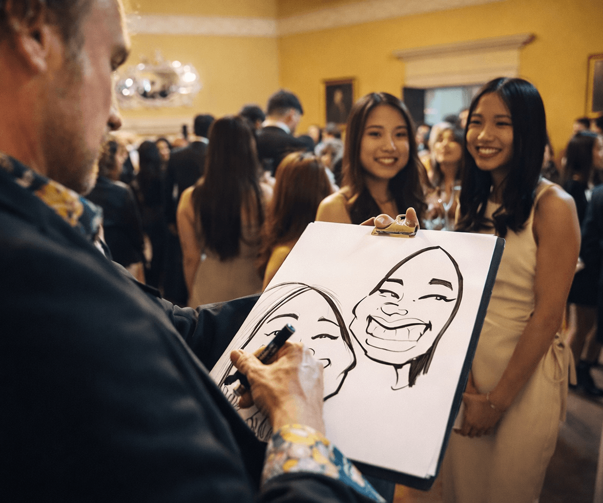 Caricaturist entertaining at graduation awards event