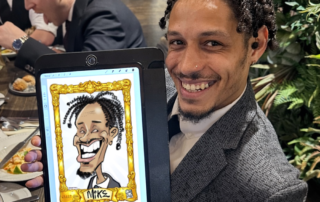 Corporate awards event guest with his iPad caricature
