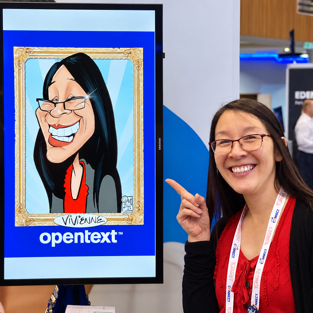 Event-Portrait-Beside-Illustrated-Monitor Vivienne with her digital caricature drawn live