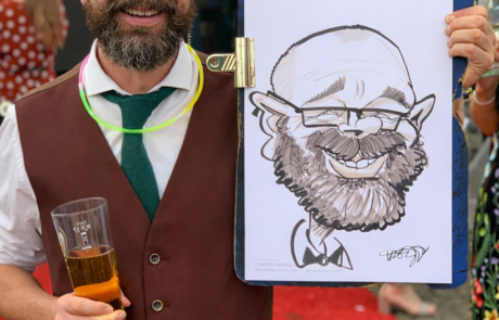 Guest with caricature at red carpet event