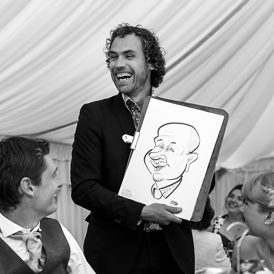 Wedding-caricaturist-Chrissy-Marshall-drawing-at-a-wedding-UK-S