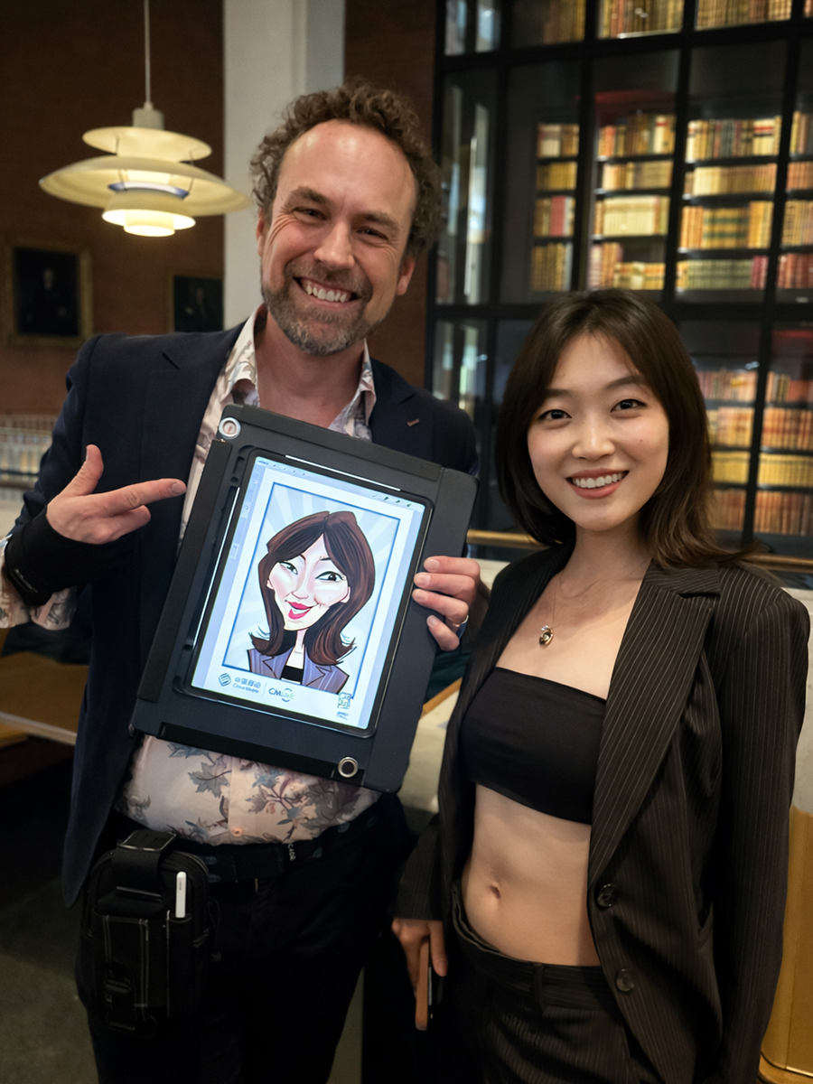 iPad caricaturist with guest at corporate event in London